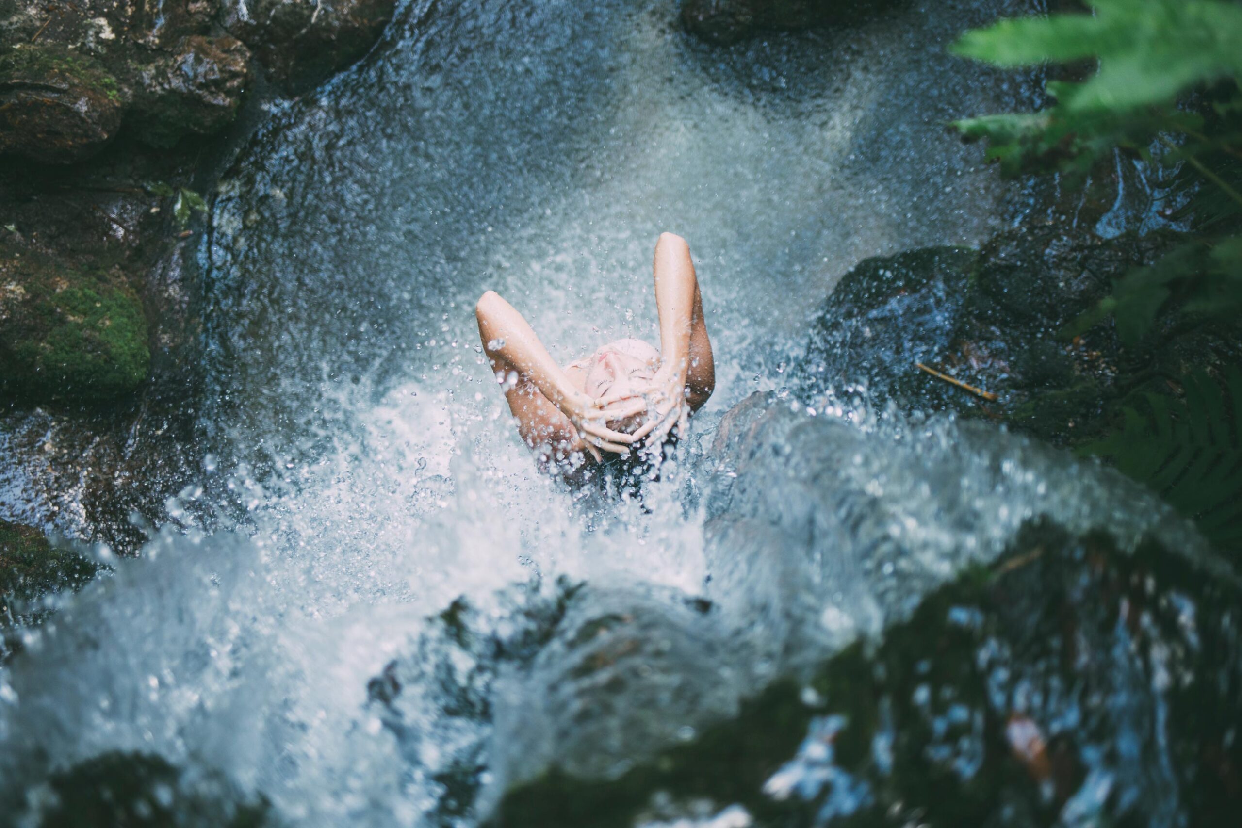 ochil-hills-women-under-waterfall
